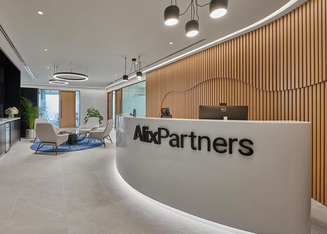 Alix and Partners reception area with LED strip lights and hanging lights