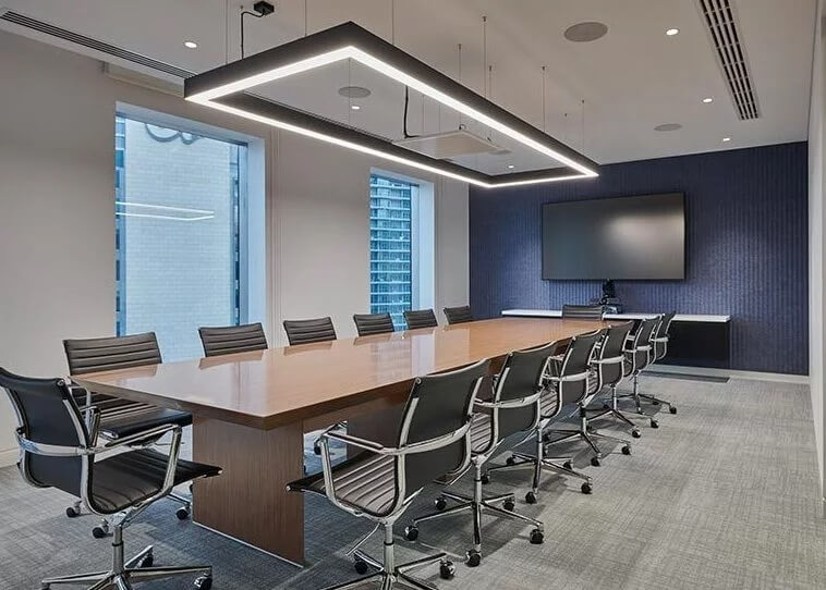 suspended rectangular light fitting in board room