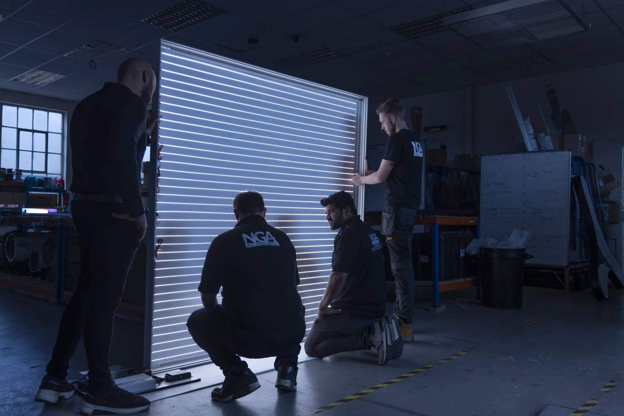 NGA team carry out a lightbox inspection
