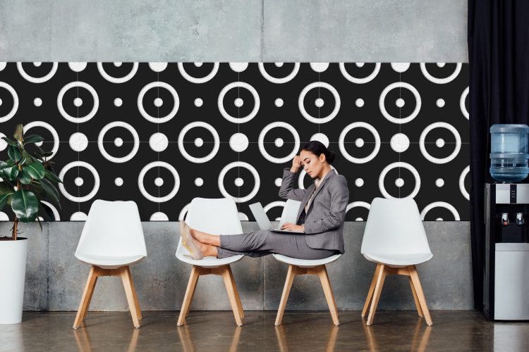 A strip of decorative acoustic wall tiles