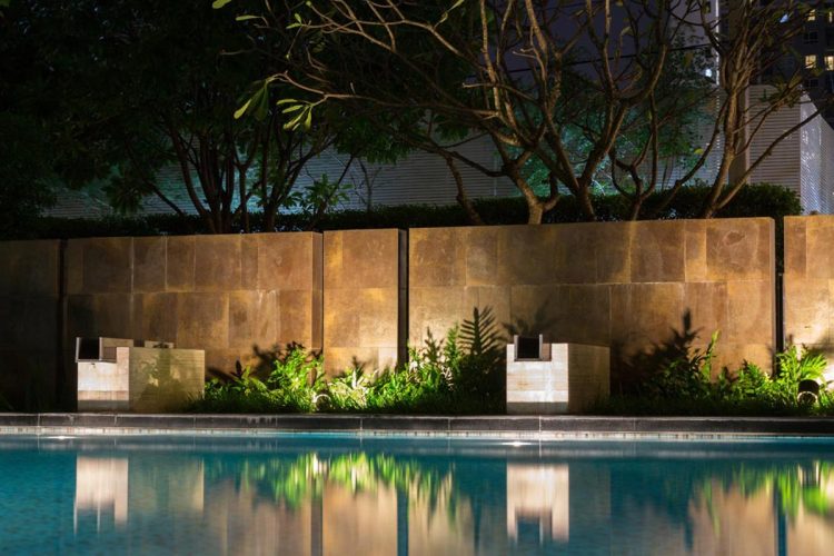 outdoor swimming pool with garden lighting