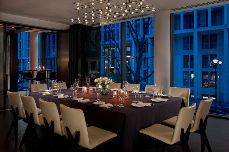 Romantic lighting design above a candle lit table