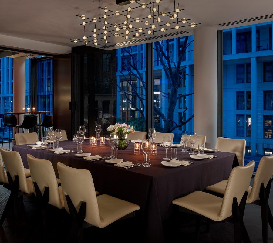 Romantic lighting design above a candle lit table